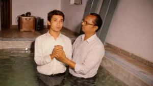 hussain andaryas being baptized by george a dauson on sunday november 18 1990